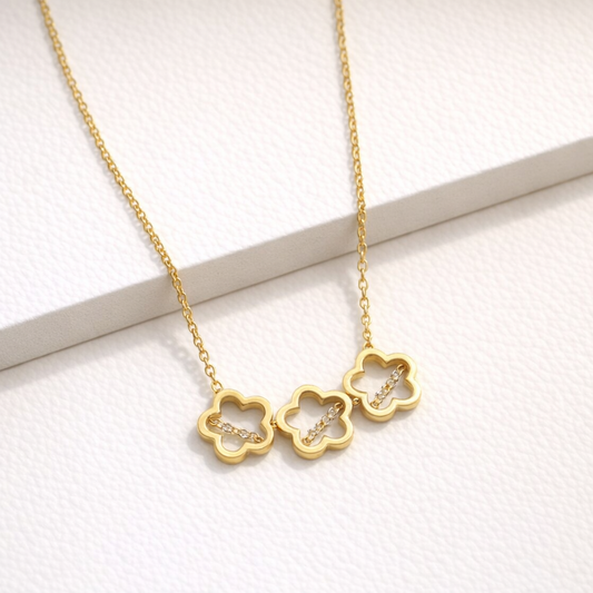 Gilded Trio: Triple Bloom Floral Necklace in Polished Gold-Tone