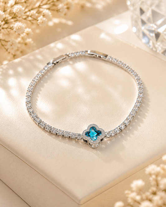 Ocean Blue Clover Charm Tennis Bracelet in Brilliant Silver-Tone Finish