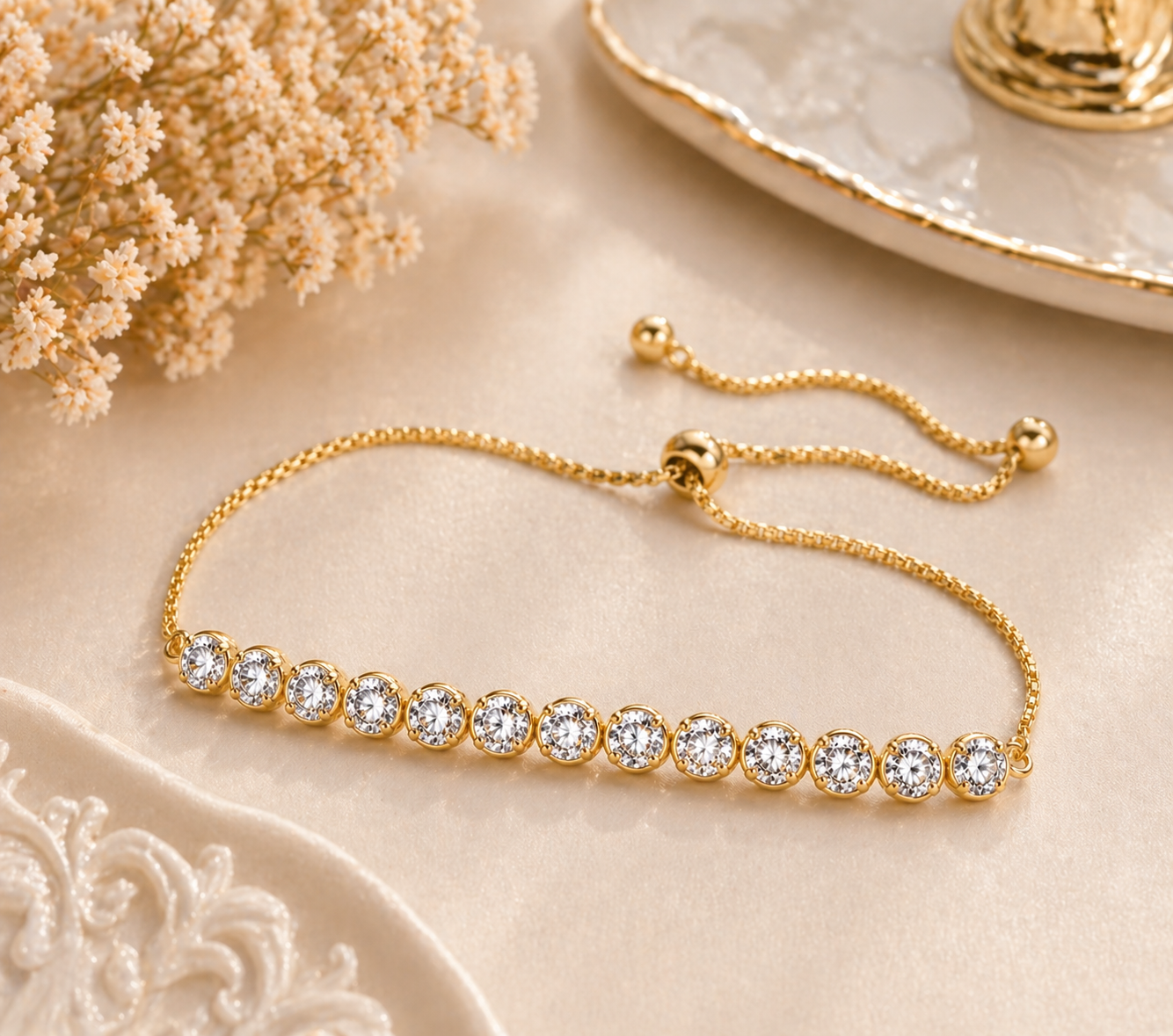 Ethereal Brilliance: Gold-Tone Adjustable Cubic Zirconia Tennis Bolo Bracelet
