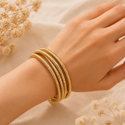 Gilded Serpent Coil: Multi-Layered Textured Snake Chain Bangle