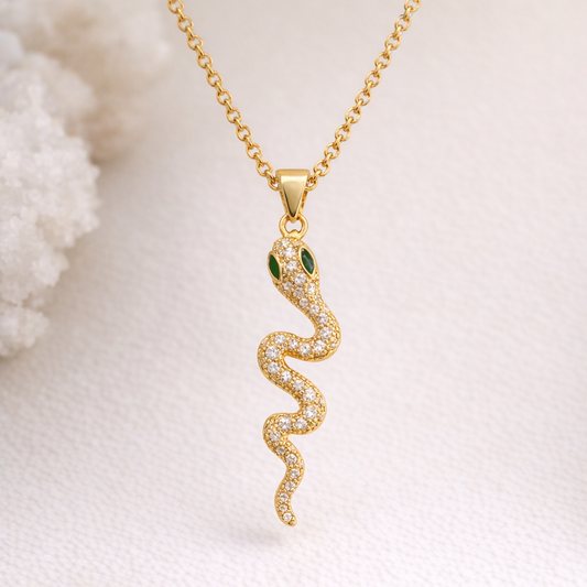 Midnight Serpent: Crystal-Pavé Snake Pendant in Radiant Gold-Tone