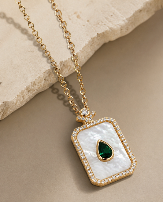Emerald Mirage: Mother-of-Pearl Mosaic Pendant with Teardrop Emerald Accent